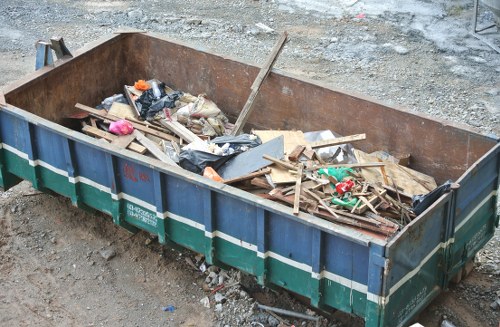 Construction site with builders waste being cleared